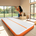 Inflatable gymnastics mat available in various sizes, made from durable PVC