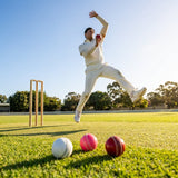 Red machine-stitched cricket ball for indoor and outdoor use - product detail