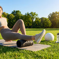 Black foam roller with EVA foam and ABS core for fitness and recovery