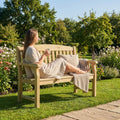 Wooden garden bench with natural finish, ideal for outdoor seating