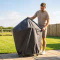 Black waterproof BBQ cover with PVC coating for outdoor protection