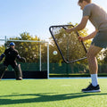 Handheld hockey rebounder with galvanised steel frame and black netting