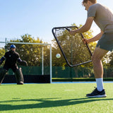 Handheld hockey rebounder with galvanised steel frame and black netting