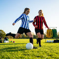 Women's football kit with long-sleeved striped shirt, shorts, and knee-high socks - product detail