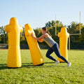 High-visibility American football training dummies in yellow PVC