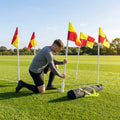 Football corner poles with fluro yellow/orange flags