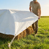 Heavy duty tarpaulin with brass eyelets and grab handles