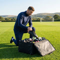 Black boot storage bag for sports teams accommodating 24 pairs