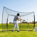 Baseball backstop net in use during outdoor practice