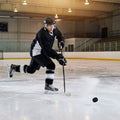 Matte black ice hockey puck made of vulcanised rubber for practice and competitive matches