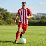 Men's striped football kit with shirt, shorts, and socks
