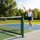 Pickleball posts with base plates in blue, black, and green for club use