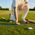 White Bowler Run-Up Marking Discs on Cricket Field