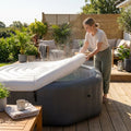 Inflatable hot tub cover made from durable PVC in grey and white