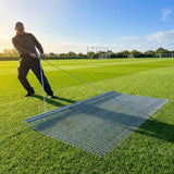 Steel drag mat on a sports field, showcasing its robust design for field maintenance - product detail