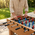 Assorted table football spare parts including player rods and aprons