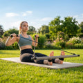 Steel Pilates bar with EVA foam padding and TPE resistance bands