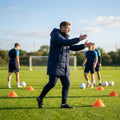 Longline padded coat in black and navy blue, water-repellent for training