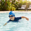 Kids swimming cap with fish design in blue and pink, made from silicone