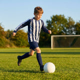 Kids' football kit with striped long sleeve shirt, shorts, and knee-high socks
