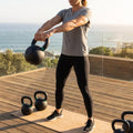 Cast iron kettlebell in various sizes and colours for gym workouts