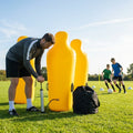 Inflatable football mannequins available in multiple sizes for training use