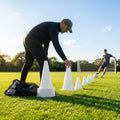 Set of vibrant football training cones in various sizes and colours