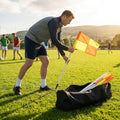 Gaelic football corner flags in orange and yellow with PVC poles