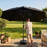 Double-sided garden parasol providing outdoor shade with steel frame