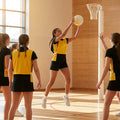 Reversible netball bibs in various colours and sizes, perfect for sports clubs
