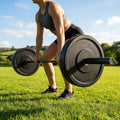 Black Olympic bumper plates made from Virgin rubber