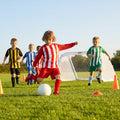 Kids' football kit with striped long sleeve shirt, shorts, and knee-high socks