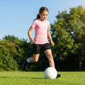 Junior girls' base layer top in various colours for sports and training