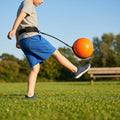 Football kick trainer with adjustable neoprene belt and training ball
