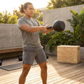 Cast iron kettlebell in various sizes and colours for gym workouts