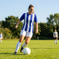 Women's striped football shirts in various colours and sizes