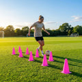 Set of vibrant football training cones in various sizes and colours