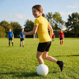 Junior girls' base layer top in various colours for sports and training