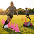 Set of vibrant football training cones in various sizes and colours