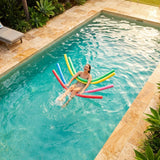Colourful swimming pool noodles made from EVA foam