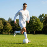 Men's football kit in various colours, including long-sleeve shirt, shorts, and socks