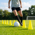 Set of vibrant football training cones in various sizes and colours