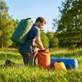Waterproof dry bag rucksack, 10L capacity in orange, ideal for outdoor sports