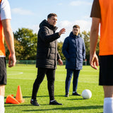 Longline padded coat in black and navy blue, water-repellent for training