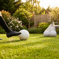 Lightweight garden football with traditional white design and colourful patterns