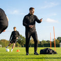 Windbreaker jacket in black and navy, ideal for training and casual use