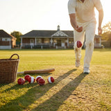 Cricket training ball with reverse swing capability, in red/white and pink/white