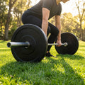 Black Olympic bumper plates made from Virgin rubber