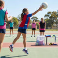 Reversible netball bibs in various colours and sizes, perfect for sports clubs