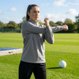 Women's tracksuit top in polyester with quarter zip and stand-up collar